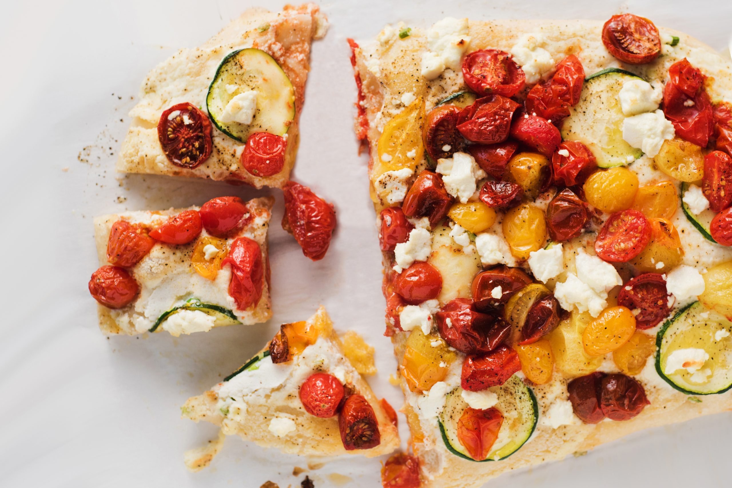 Goat Cheese & Ricotta Flatbread with Tomatoes and Zucchini Food