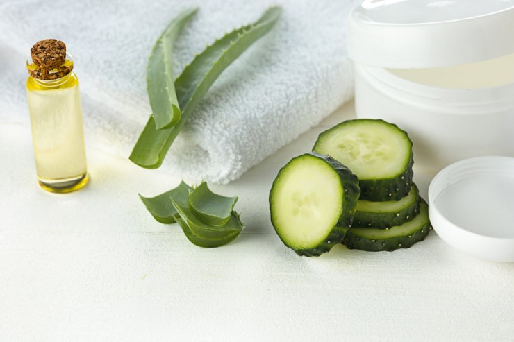 Cucumbers used as cosmetics.