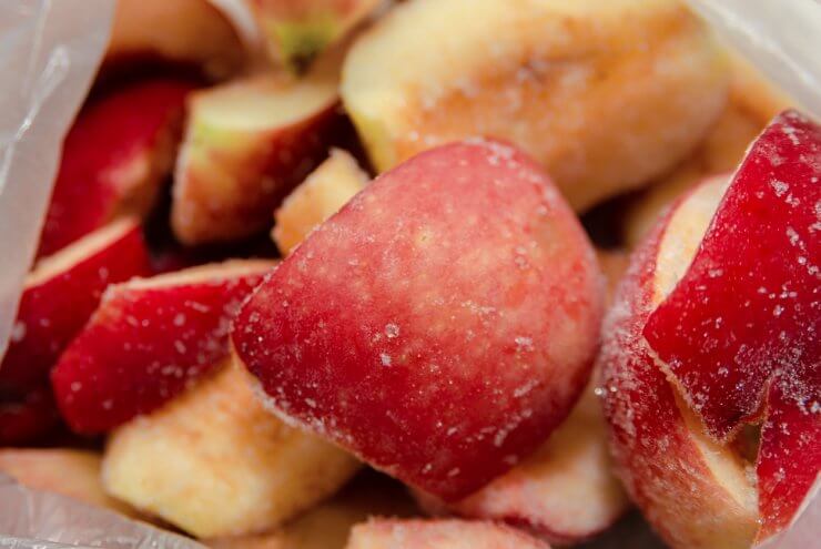 Red frozen sliced apples.