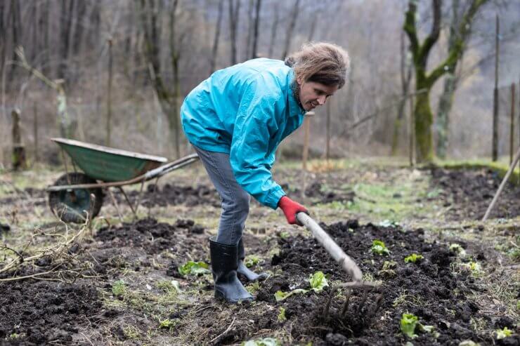 Woman Digging Up Dirt 