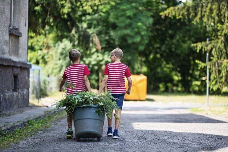 kids helping clean up garden