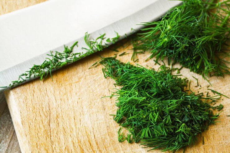 Nutritious dill on cutting board