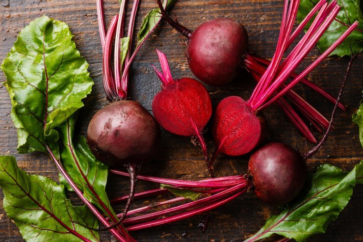 Red beetroot with green leaves