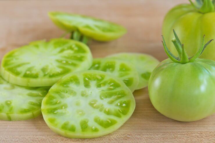 Green Tomatoes on Wood Cutting Board