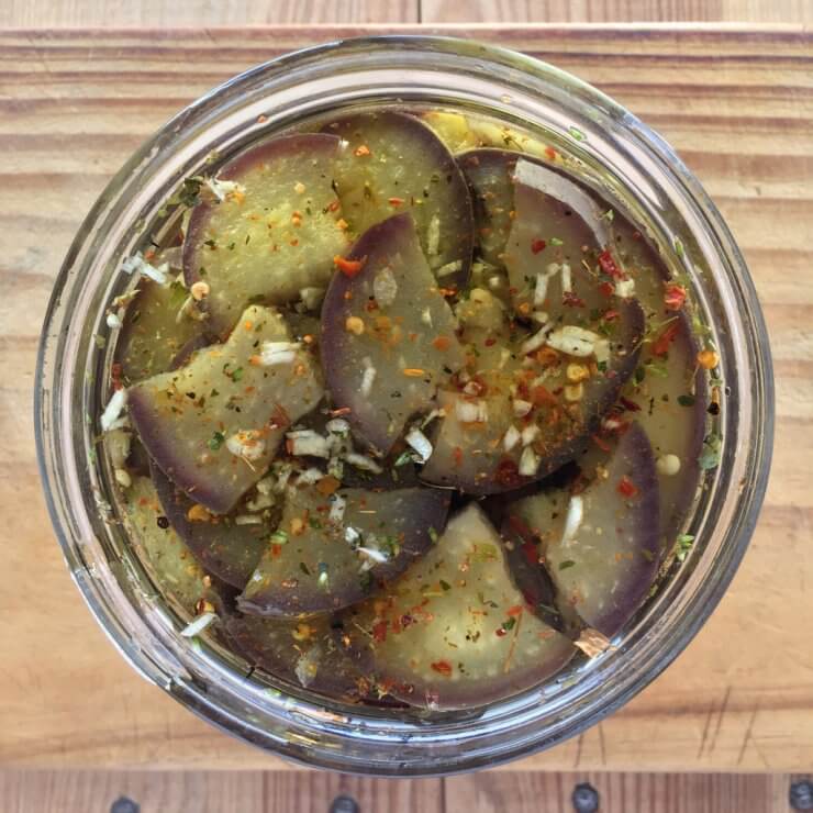 Pickled eggplant in glass jar
