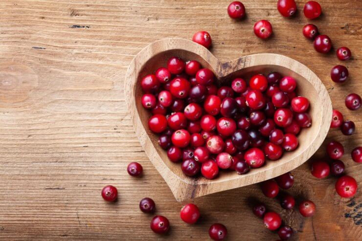 Healthy cranberries in a wooden bowl