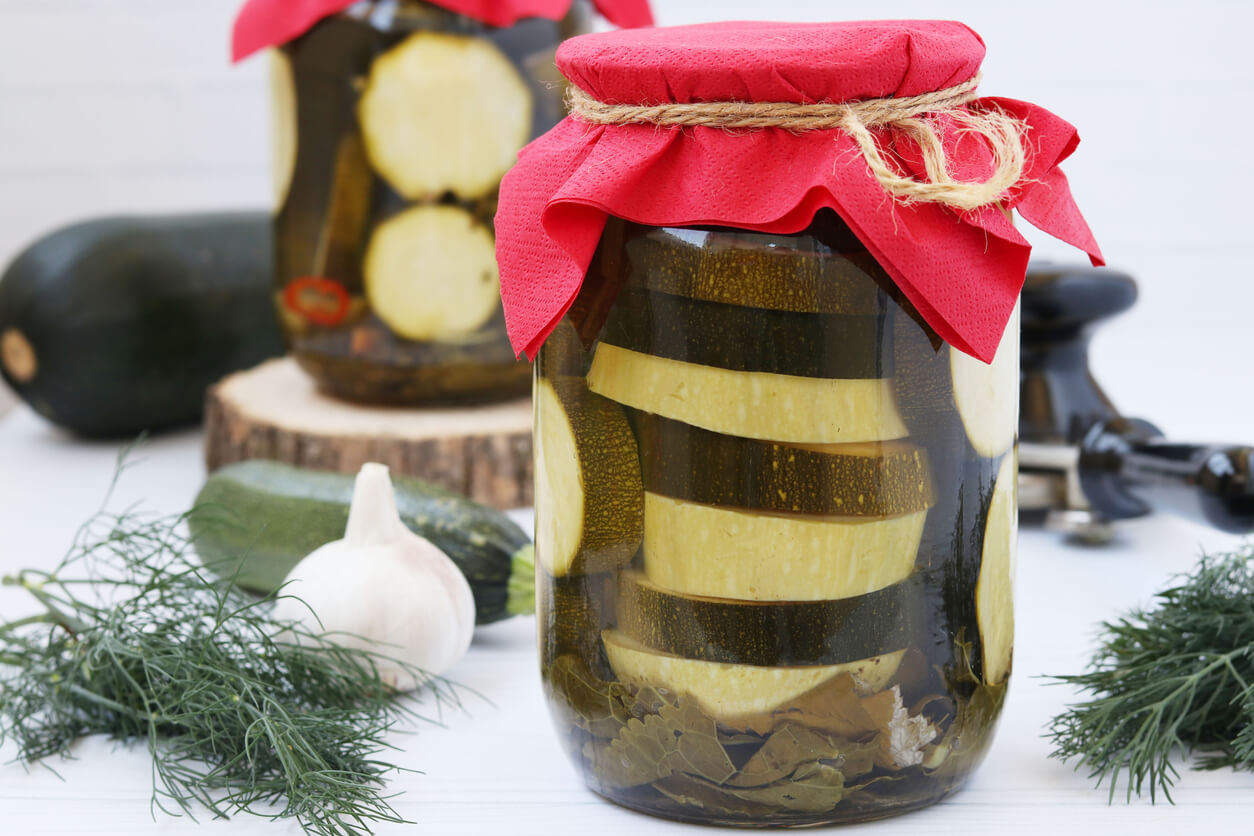 Marinated zucchini in glass jars