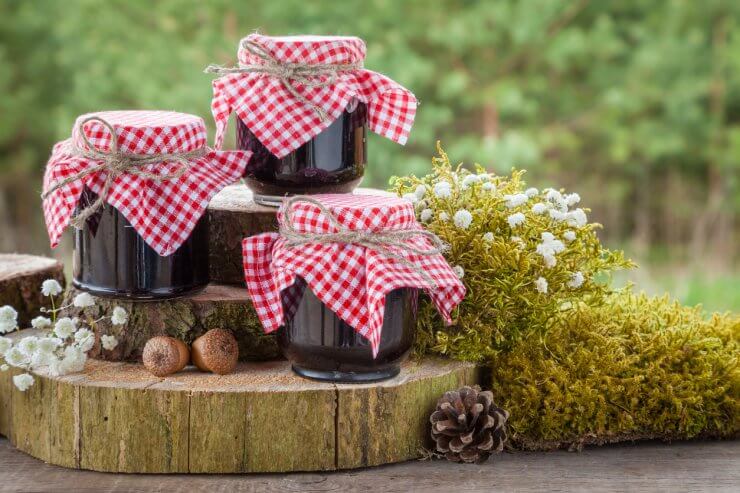 Jars of jam and decoration in rustic style