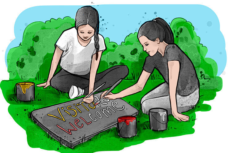 Girls making a Signboard