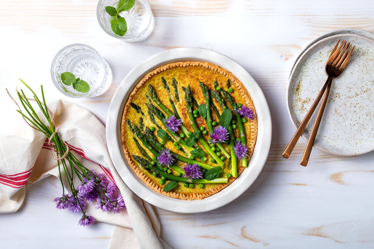 Green asparagus, sweet peas Tart with edible chives flowers or blossoms