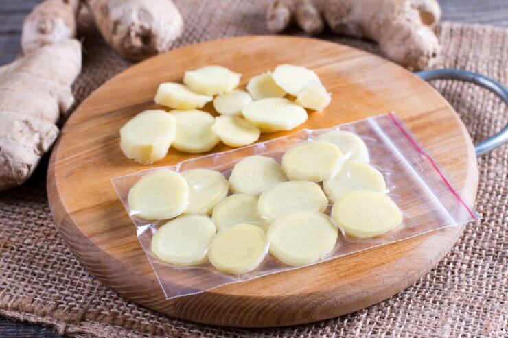 Chopped ginger on the wooden board