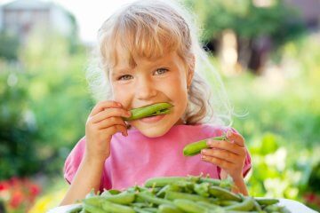 Girl with peas