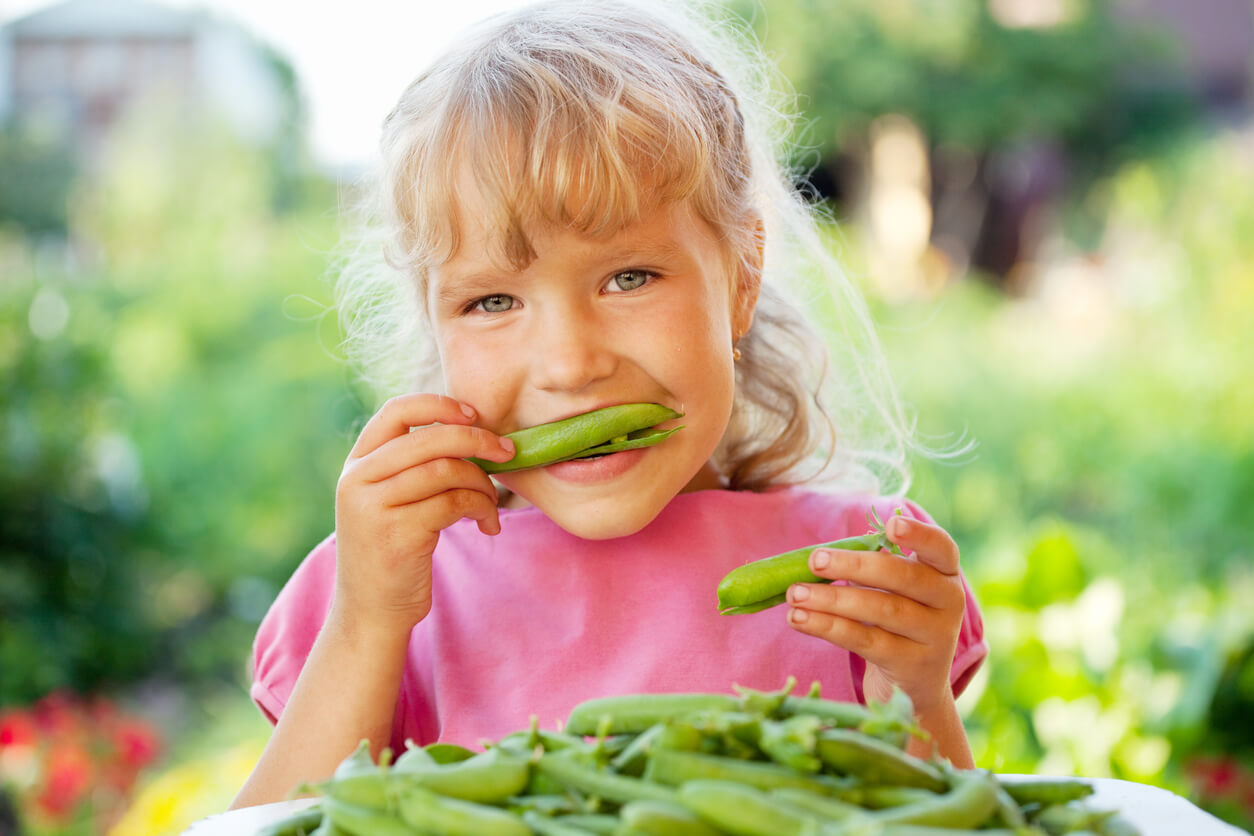 Girl with peas