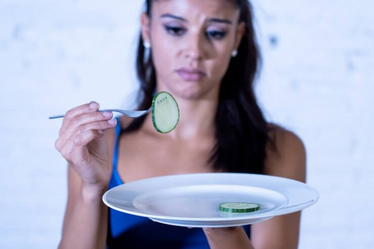 Woman with Cucumber