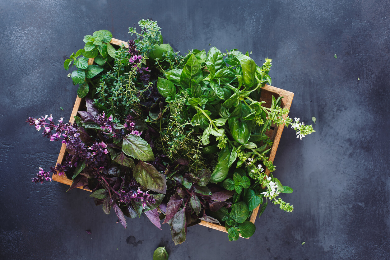 salad making in a wooden crate.